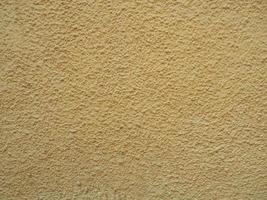 yellow plaster texture background photo