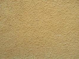 yellow plaster texture background photo