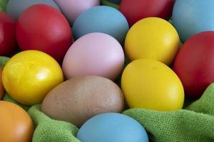 eggs painted in different colors to celebrate Easte photo