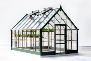 Glass greenhouse with plants photo