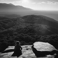 A walker meditating on top of the mountain, vintage style - photo