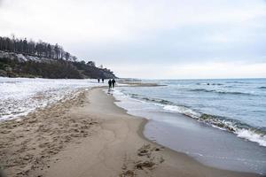 winter landscape from the beach on the Baltic Sea with snow in Poland photo