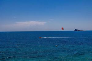 landscape beach in benidorm spain on a warm summer holiday day photo