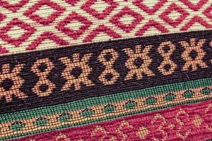 interesting background with handmade Turkish rugs in close-up photo