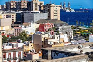 original head of the Spanish city, the capital of Gran Canaria, Las Palmas, from a lookout point to colorful houses photo