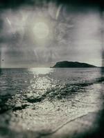 photo of a beach in Turkey in Alanya on a beautiful summer day stylized as an old photographA beautiful photo of a beach in Turkey in Alanya on a beautiful summer day stylized as an old photograph