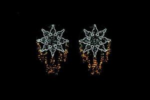 light ornament decorative background on black night background photo