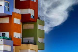 abstract colorful building in Alicante Spain over blue sky background photo