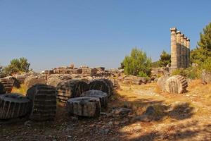 old ruins of the ancient temple of Athena in Priene in Turkey on a hot summer day photo