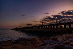 l sunset landscape of alicante spain with pier photo