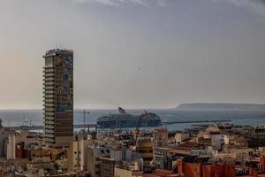 landscape of the city of Alicante panorama from the viewpoint of the city and the port on a warm sunny day photo