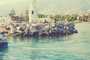 original landscape of the port and city of Alanya in Turkey from the sea photo