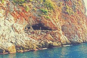 Mediterranean landscape and rocks in the Turkish city of Alanya on a warm summer afternoon photo