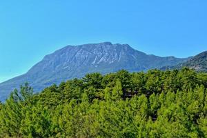 beautiful view of the Turkish mountains covered with green forest on a summer day, photo