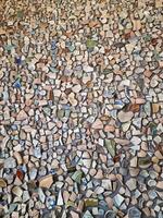 background from pieces of clay colored broken pottery decoration abstract photo