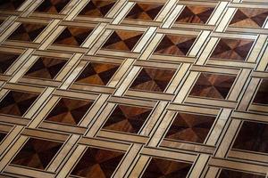 original background from an antique old wooden floor creating an interesting abstract pattern photo