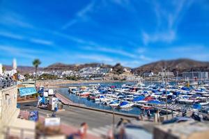 landscape of the port of Puerto Rico the city of the spanish canary island Gran canaria photo