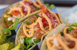 Close up of Seafood Taco Trio photo