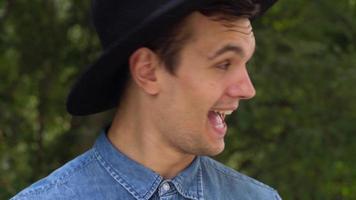 Portrait of young hipster man in hat video