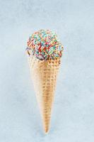 Ice cream cones with sprinkles. Summer Dessert ice-cream, yummy delicious treat. photo