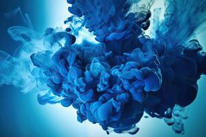 Blue smoke. Explosion paint drops. . photo