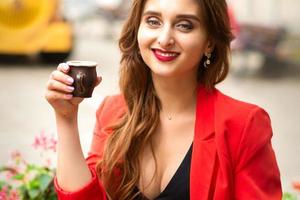 Woman with cup of coffee photo