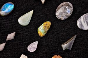 Gemstones on dark background photo