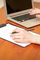 Female working with the documents photo