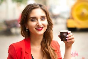 Woman with cup of coffee photo