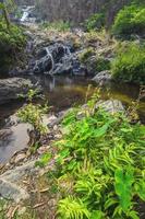 Khlong Nam Lai Waterfall, Beautiful waterfalls in klong Lan national park of Thailand photo