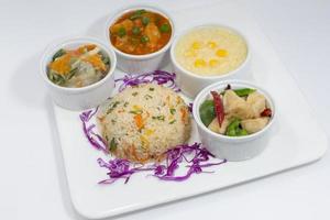 Picking Chicken, Prawn Garlic Pepper, Mixed Vegetable, Fried Rice And Thai Soup Platter. photo