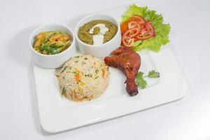 Tandoori Chicken, Dal Makhani, Mixed Vegetable, Green Salad and Fried Platter. photo