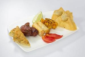 Auonthon, Spring roll, Prawn Toast, Grilled Potato and Buffalo wings Platter. photo