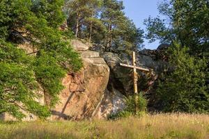 devil stone in a forest in the mountains of Pogorzyce in Poland on a summer day photo