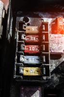the fuse box of the car is covered with corrosion from water ingress photo