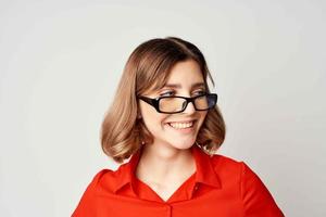 woman in red shirt wearing glasses emotions official office photo