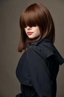 Side view sensual lady European appearance coat photo