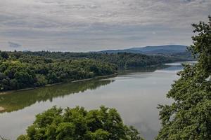 landscape of the lagoon at the dam in Dobczyce in Poland on a warm summer cloudy day photo