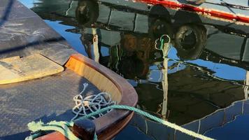 Fishing Boat Reflection on Sea Water video