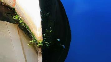 Fishing Boat Reflection on Sea Water video