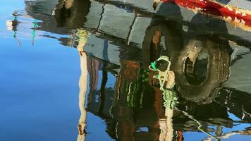 Fishing Boat Reflection on Sea Water video