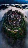 In spring Jiangnan Cliff Village surrounded by fog photo