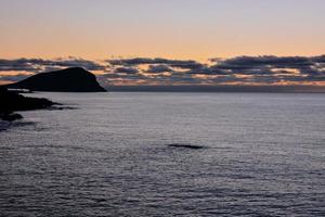 Sunset over the sea photo