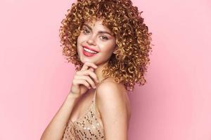 Beautiful woman Curly hair red lips smile studio charm photo