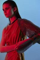 beautiful woman red light silver armor chain mail fashion Lifestyle unaltered photo