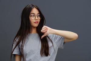 young woman in a t-shirt glasses Youth style fun isolated background photo