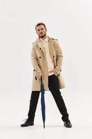 handsome man coat modern lifestyle accessories full height photo