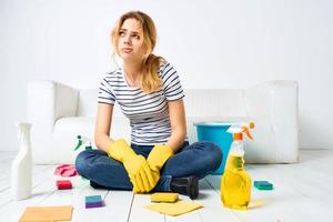 Woman home cleaning housework care detergent interior photo