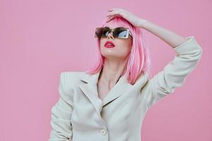 Beautiful fashionable girl modern style pink hair sunglasses color background unaltered photo