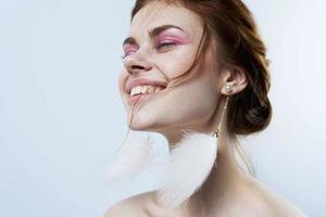 attractive woman bright makeup fluffy earrings jewelry fashion studio photo